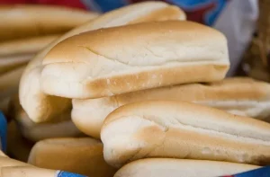 Hot dog bread Freshly warmed Chilean completo bread rolls opened and ready for assembly.