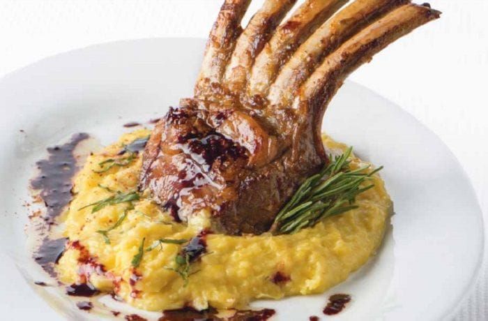 Chilean lamb chops with corn pastelera and Carménère wine reduction — Chuletas de cordero con pastelera de choclo