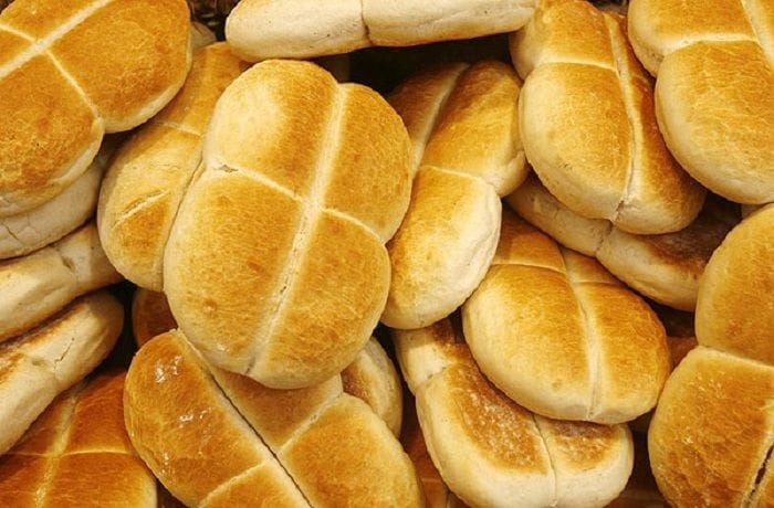 Step 5 — Marraqueta bread, the classic vessel for the Potito Sandwich Chilean marraqueta bread, crispy and warm, the essential base for the Potito Sandwich