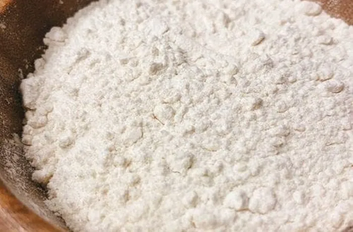 Flour and butter worked to breadcrumb texture for Chilean banana kuchen dough — the base of the southern Chilean kuchen crust