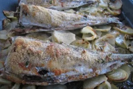 Chilean baked jack mackerel (jurel al horno) with olive oil, white wine, garlic, and breadcrumbs — healthy traditional recipe