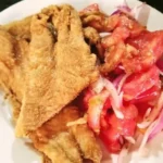 Chilean beer-battered hake fillets coated in toasted flour — crispy fried merluza recipe