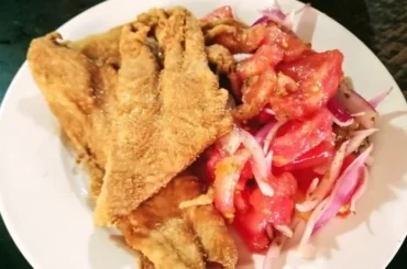 Chilean beer-battered hake fillets coated in toasted flour — crispy fried merluza recipe