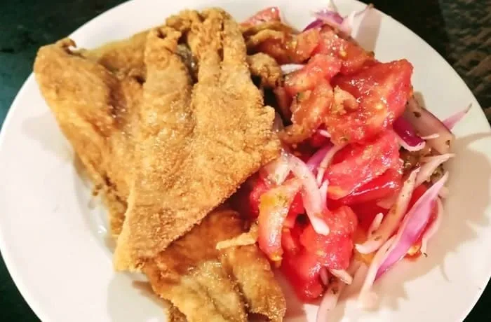 Chilean beer-battered hake fillets coated in toasted flour — crispy fried merluza recipe
