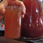 Chilean chichón cocktail — equal parts grape chicha and pipeño wine in a tall glass