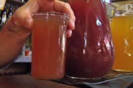 Chilean chichón cocktail — equal parts grape chicha and pipeño wine in a tall glass