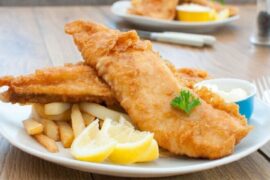 Chilean fried pejerrey (silverside) — crispy beer batter fish served with lemon