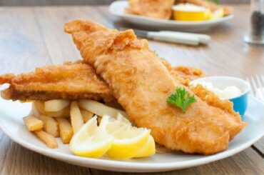 Chilean fried pejerrey (silverside) — crispy beer batter fish served with lemon