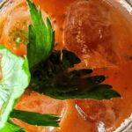 Chilean michemar: lager beer with marinated piure and fresh clams, salted and merkén-rimmed glass