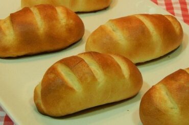 Chilean pan de leche — soft golden milk bread rolls fresh from the oven, perfect for breakfast