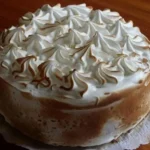 Chilean tres leches cake — homemade three-milk sponge cake soaked with condensed milk, evaporated milk and cream, topped with Swiss meringue
