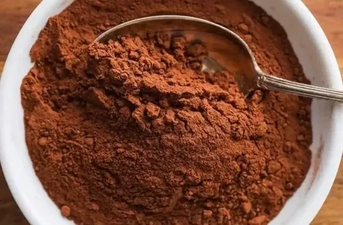 Adding cocoa powder to create the chocolate marble swirl