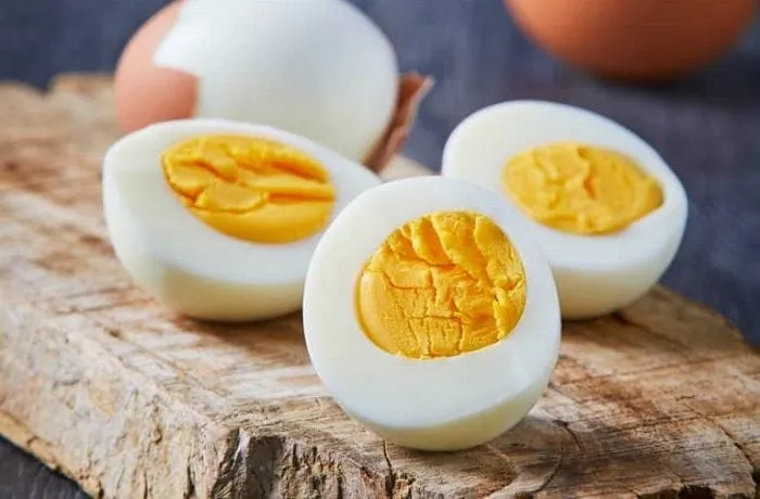 Hard-boiled eggs sliced and added to Chilean campesino pork causeo