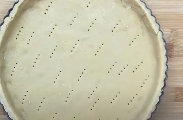 Chilean kuchen shortcrust dough formed into a ball and ready to be chilled for 30 minutes