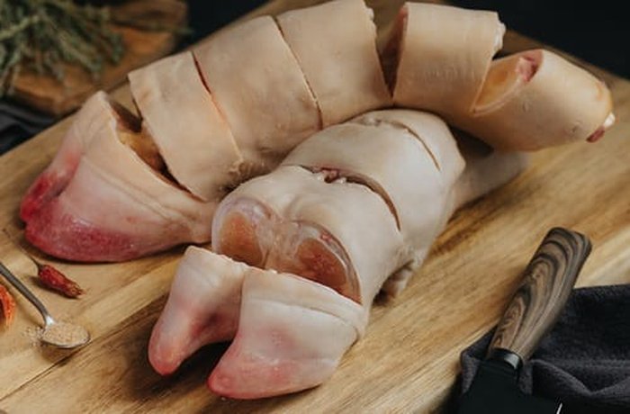Raw beef feet cut into pieces, ready for blanching and pressure-cooking for caldo de pata