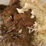 Chilean bistec de pana al ajo — garlic-marinated beef liver steaks served with rice