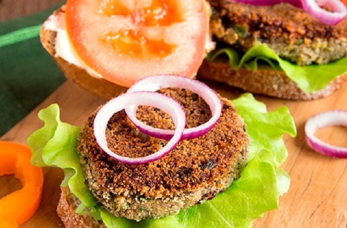 Chilean cochayuyo seaweed burgers served on whole wheat bread with lettuce and tomato
