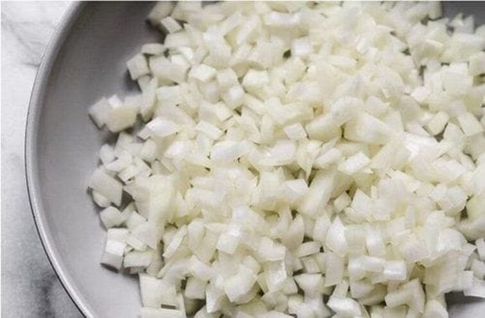 diced onion and garlic for cochayuyo burger sofrito base