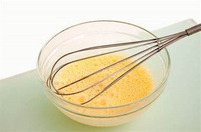 beaten egg drizzled in a thin stream into the hot sopa de locos to enrich the broth