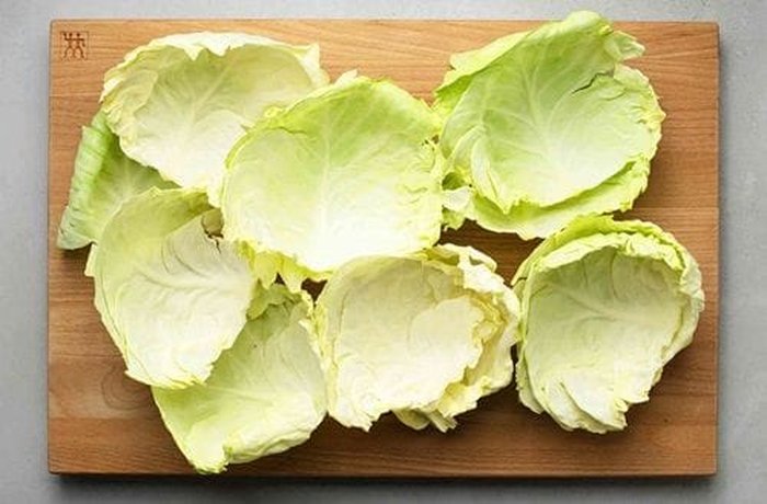Large cabbage leaves blanched for rolling