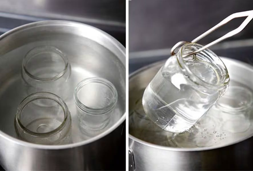 Boiling jars for jam Glass jars being boiled to sterilize them before filling with hot murta jam.