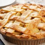 Chilean apple kuchen with a lattice crust and cinnamon apple filling