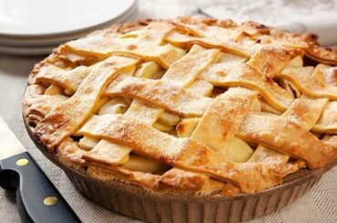 Chilean apple kuchen with a lattice crust and cinnamon apple filling