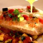 Chilean reineta fillets baked on a bed of vegetables