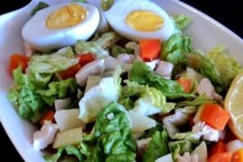 Chilean salpicon with diced beef, potato, carrot, and egg on lettuce