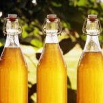 Bottles of traditional Chilean beeswax chicha, an amber drink from the Alto Biobio served cold