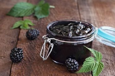 Homemade Chilean blackberry jam, dulce de murras, in glass jars
