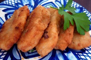 Chilean breaded bull criadillas fried golden in olive oil