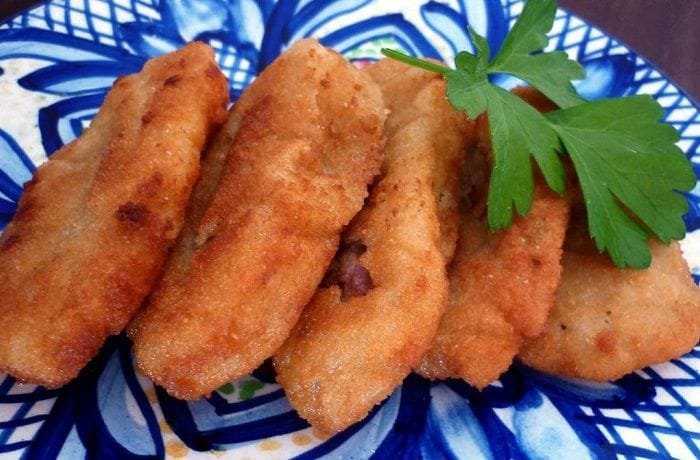 Chilean breaded bull criadillas fried golden in olive oil