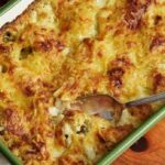 Chilean cauliflower and cheese budin, golden and gratinated, fresh from the oven and cut into portions