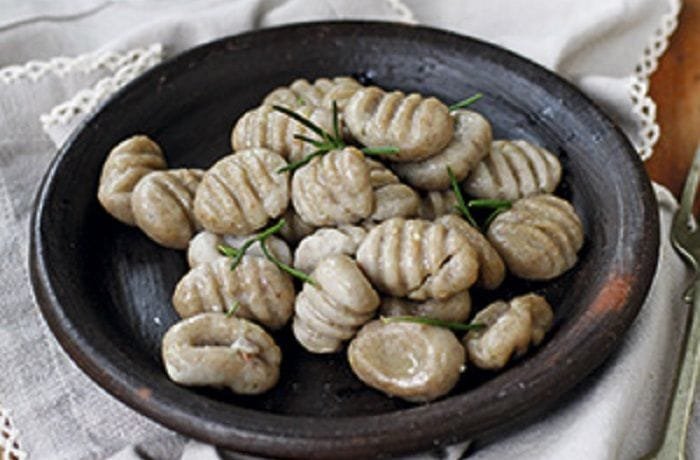 Chilean chestnut gnocchi sautéed in butter and rosemary
