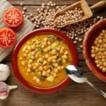 Chilean chickpea stew with squash and tomato in a deep bowl