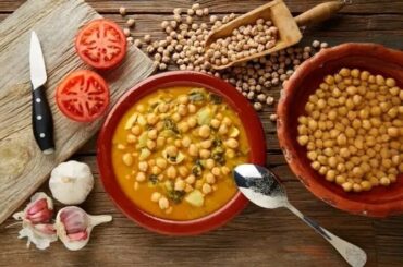 Chilean chickpea stew with squash and tomato in a deep bowl