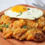 Chilean cochayuyo charquican, a seaweed and vegetable mash with a fried egg