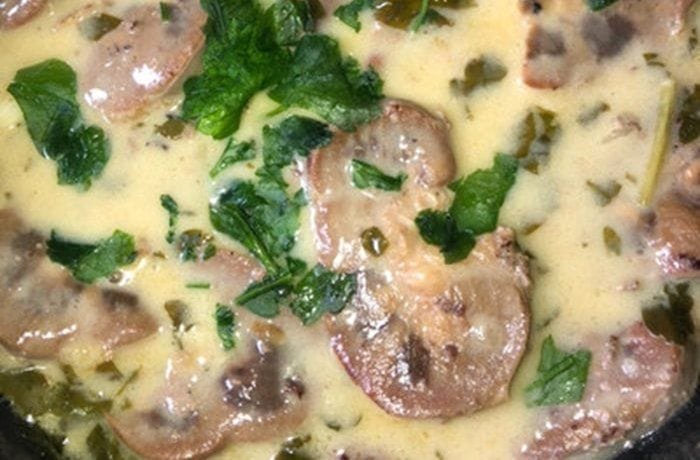Chilean beef kidneys in a thick creamy sauce with fresh cilantro