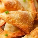 Crispy fried wontons filled with pork and shrimp, served with sweet and sour sauce
