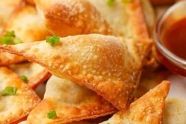 Crispy fried wontons filled with pork and shrimp, served with sweet and sour sauce