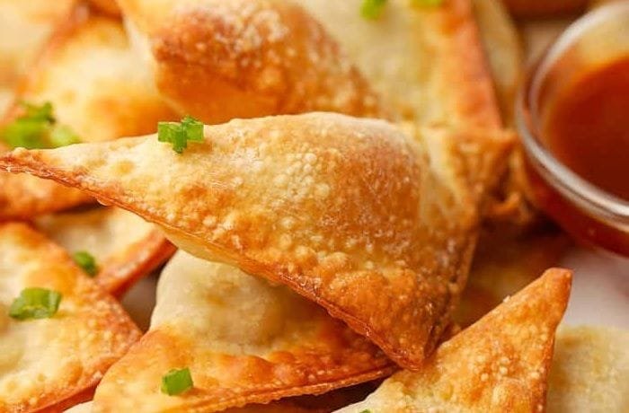 Crispy fried wontons filled with pork and shrimp, served with sweet and sour sauce