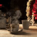 Chilean gloriao, a hot drink of aguardiente and coffee served in a kettle and china cups