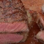 Chilean lomo liso a la parrilla, grilled sirloin cut into juicy steaks with coarse salt