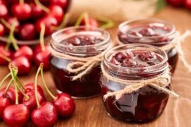 Homemade Chilean cherry jam in glass jars
