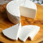 Chilean homemade queso fresco, white and creamy, served with bread and jam