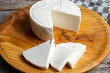 Chilean homemade queso fresco, white and creamy, served with bread and jam