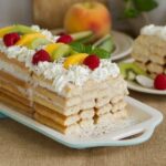 Chilean ladyfinger cake, layers of coffee soaked champagne biscuits with condensed milk cream and meringue