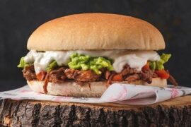 Chilean mechada italiana sandwich in marraqueta with tomato, avocado, and homemade mayonnaise