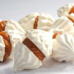 Chilean merenguitos, small crisp meringues sandwiched with manjar
